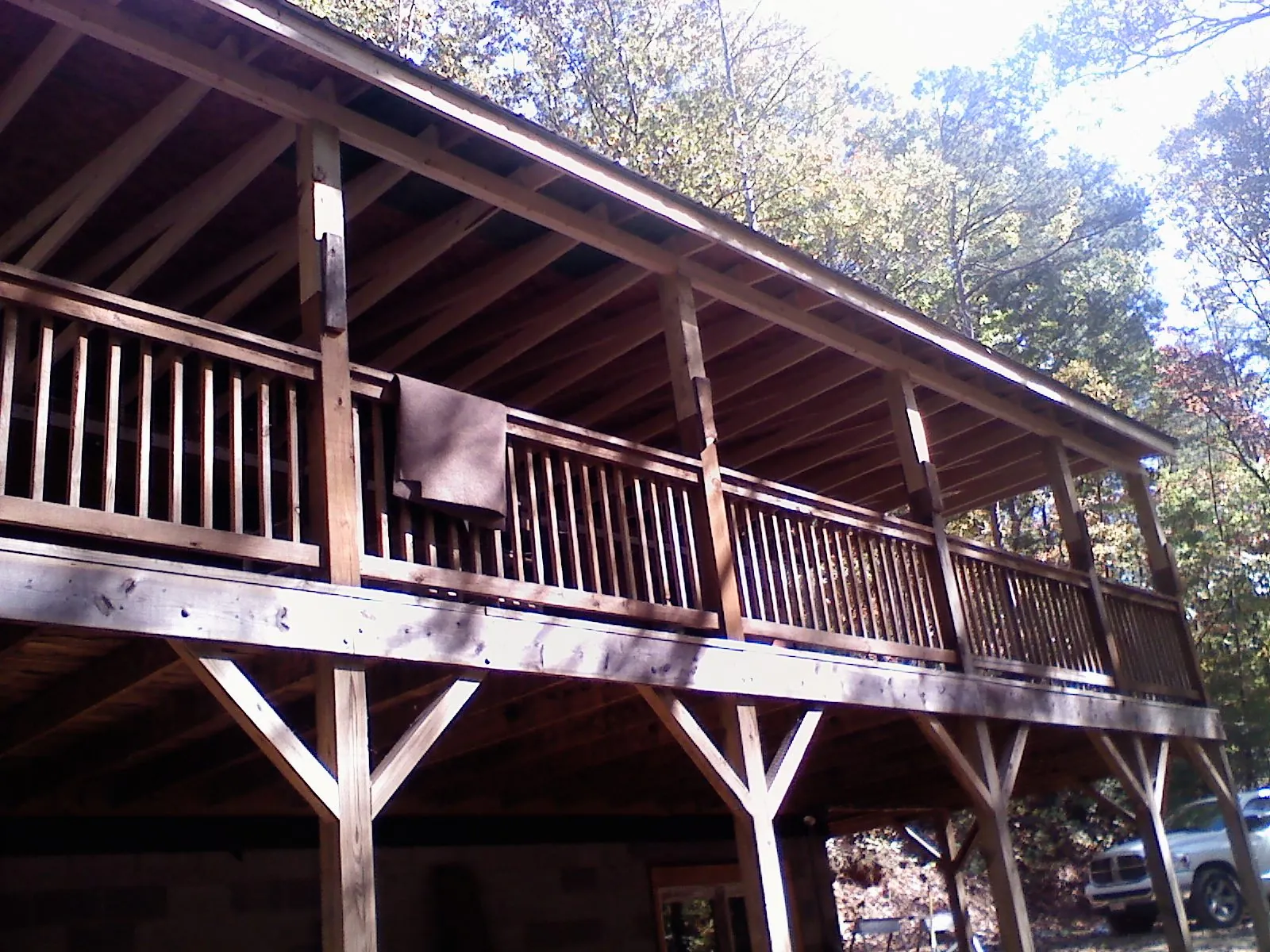 Timber framing under a new elevated porch and deck — Roof Leak Repair in East Lynne by Roofing Brothers